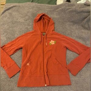 Soooo cute zip up kids size!! Fits like a size small!!